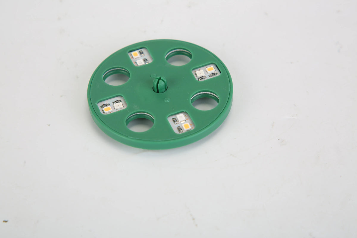 Close-up of the green LED grow-light top used with the seed starter kit.