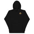Black premium pullover hoodie with the gold-tone SET Anubis crest on the wearer’s left chest — front view.